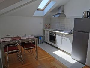 Kuchyň nebo kuchyňský kout v ubytování Apartments Mara Cres