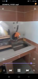 a picture of a kitchen with a microwave at Douas dalia in Dalia