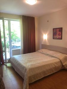 Postel nebo postele na pokoji v ubytování Apartcomplex Panorama Dreams
