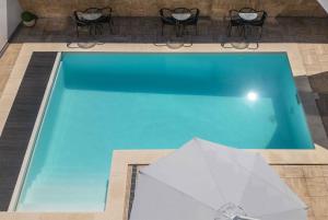Bazén v ubytování Hotel Rosa Mística by Umbral nebo v jeho okolí