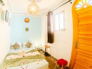 Riad Dar Yassine客房内的一张或多张床位