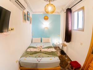 Riad Dar Yassine客房内的一张或多张床位