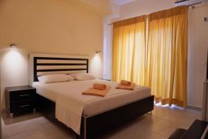 Cama ou camas em um quarto em Marku Palace