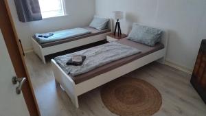 Postel nebo postele na pokoji v ubytování Günstige Monteurwohnung in Bad Grund