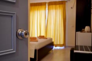 Cama ou camas em um quarto em Marku Palace