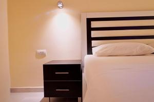 Cama ou camas em um quarto em Marku Palace
