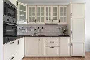 Η κουζίνα ή μικρή κουζίνα στο Beyond Living - Apartment Zentral