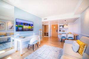 VIP Executive Suites do Marquês Hotel的电视和/或娱乐中心