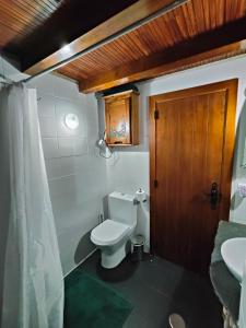 a bathroom with a toilet and a sink at Azoka by the River- Proença-a-Nova in Maljoga de Proença +22 photos
