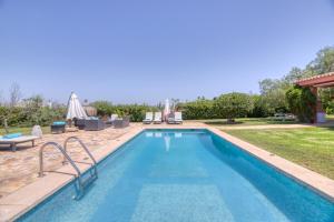 Bazén v ubytovaní Villa Kentia Mallorca, charming and stylish country house close to Palma alebo v jeho blízkosti