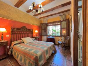 Postel nebo postele na pokoji v ubytování Casa Rural Edulis