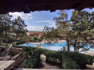 an image of a swimming pool in a house at Rotondo Residence - Simar Vacanze in Porto Rotondo