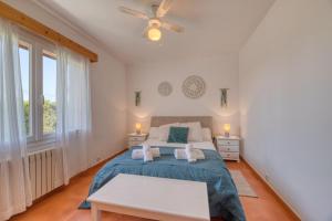 Posteľ alebo postele v izbe v ubytovaní Villa Kentia Mallorca, charming and stylish country house close to Palma