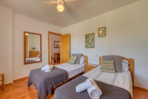 Posteľ alebo postele v izbe v ubytovaní Villa Kentia Mallorca, charming and stylish country house close to Palma