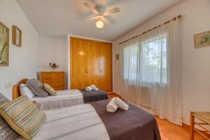 Posteľ alebo postele v izbe v ubytovaní Villa Kentia Mallorca, charming and stylish country house close to Palma