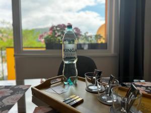 a bottle of kaya sitting on top of a table at Małe Pieniny in Szczawnica