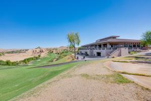 a view of the clubhouse at the golf course at Mesquite Apartment Walk to Wolf Creek Golf Club! in Mesquite