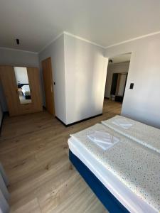 Postel nebo postele na pokoji v ubytování Baltic Stay