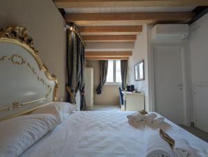 FloVe' Rooms Venice客房内的一张或多张床位