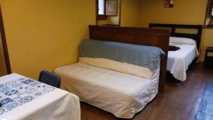 Postel nebo postele na pokoji v ubytování Casa del OSO2