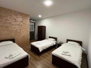 Postel nebo postele na pokoji v ubytování Apartmani Bosfor