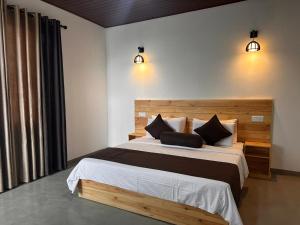 Postel nebo postele na pokoji v ubytování Senasuma Homestay