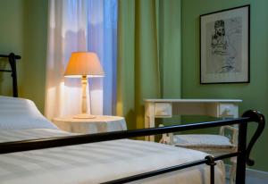 Postel nebo postele na pokoji v ubytování B&B Maison Biagetti