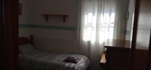 Fotografia z galérie ubytovania Casa con jardín privado cerca de la playa, para descansar y relajarse v destinácii Chipiona