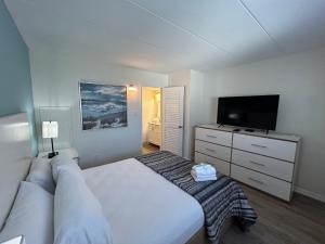 Postel nebo postele na pokoji v ubytování Esplanade Suites - A Sundance Vacations Property + 25 fotografií