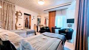 TV a/nebo společenská místnost v ubytování Ullaredsgården B&B Express