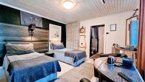 Postel nebo postele na pokoji v ubytování Ullaredsgården B&B Express