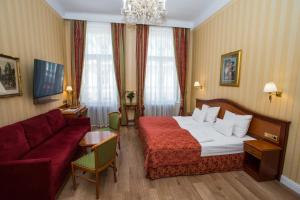 Postel nebo postele na pokoji v ubytování Pension Opera Suites I Self Check In