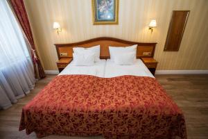 Postel nebo postele na pokoji v ubytování Pension Opera Suites I Self Check In