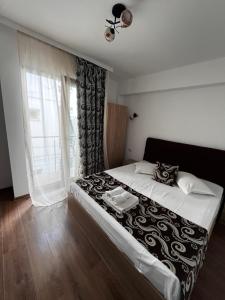 Postel nebo postele na pokoji v ubytování Elegance