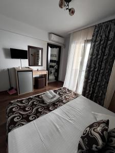 Postel nebo postele na pokoji v ubytování Elegance