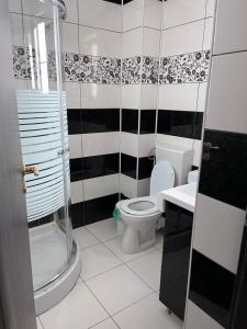 Koupelna v ubytování Elegance