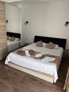 Postel nebo postele na pokoji v ubytování Elegance