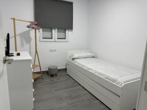 Posteľ alebo postele v izbe v ubytovaní Santa Rita