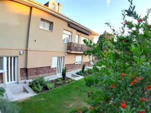Vonkajšia záhrada v ubytovaní Apartman Veiger 3