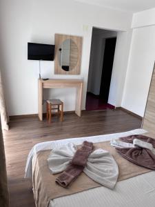 Postel nebo postele na pokoji v ubytování Elegance