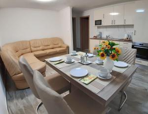 Kuchyňa alebo kuchynka v ubytovaní Apartman Veiger 3