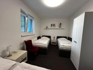 Postel nebo postele na pokoji v ubytování Apartmán Hugo