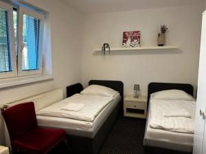 Postel nebo postele na pokoji v ubytování Apartmán Hugo