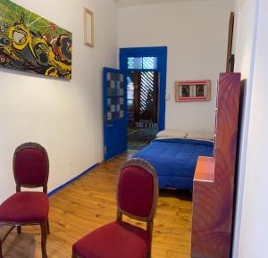 Postel nebo postele na pokoji v ubytování Art Hostel Casa Chaman