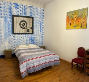 Postel nebo postele na pokoji v ubytování Art Hostel Casa Chaman