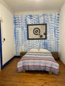 Postel nebo postele na pokoji v ubytování Art Hostel Casa Chaman