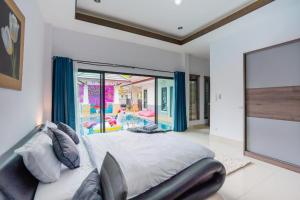 Billede fra billedgalleriet på Barbie Pool Villa Na Jomtien i Na Jomtien + 31 billeder