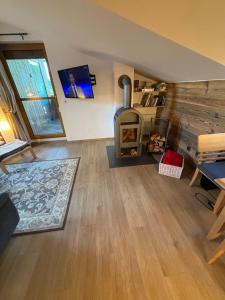 TV o dispositivi per l'intrattenimento presso Karbergsuite Turrach