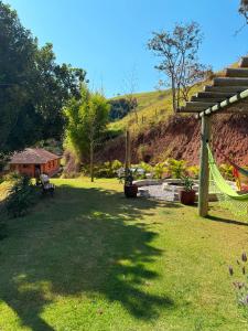 Ein Garten an der Unterkunft Pousada Shangri-lá