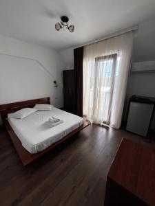 Postel nebo postele na pokoji v ubytování Elegance